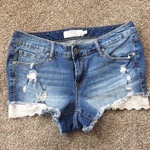 Torrid plus size 10 distressed lace denim shorts